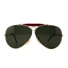 1988 rayban gold-tone aviator shooter sunglasses with red brow bar