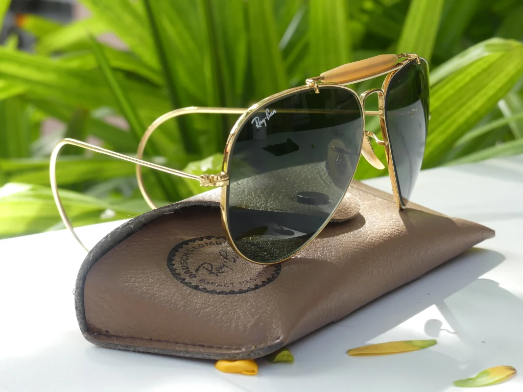 Outdoorsman Gold Aviator Sunglasses showcasing reinforced brow bar and sweat-guard vents
