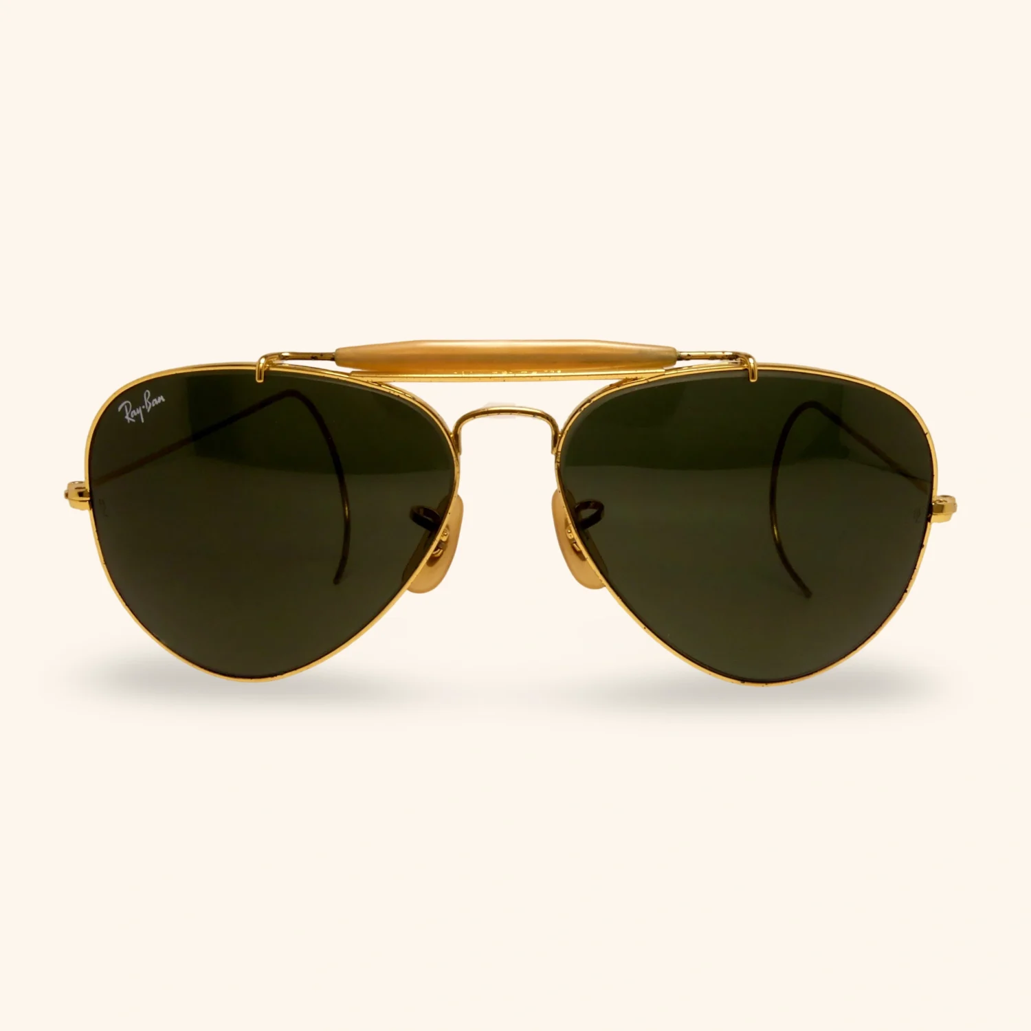 1982 Ray-Ban Outdoorsman sunglasses with medium gold frame and classic G-15 green lenses, made in USA.