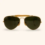 1982 Ray-Ban Outdoorsman sunglasses with medium gold frame and classic G-15 green lenses, made in USA.